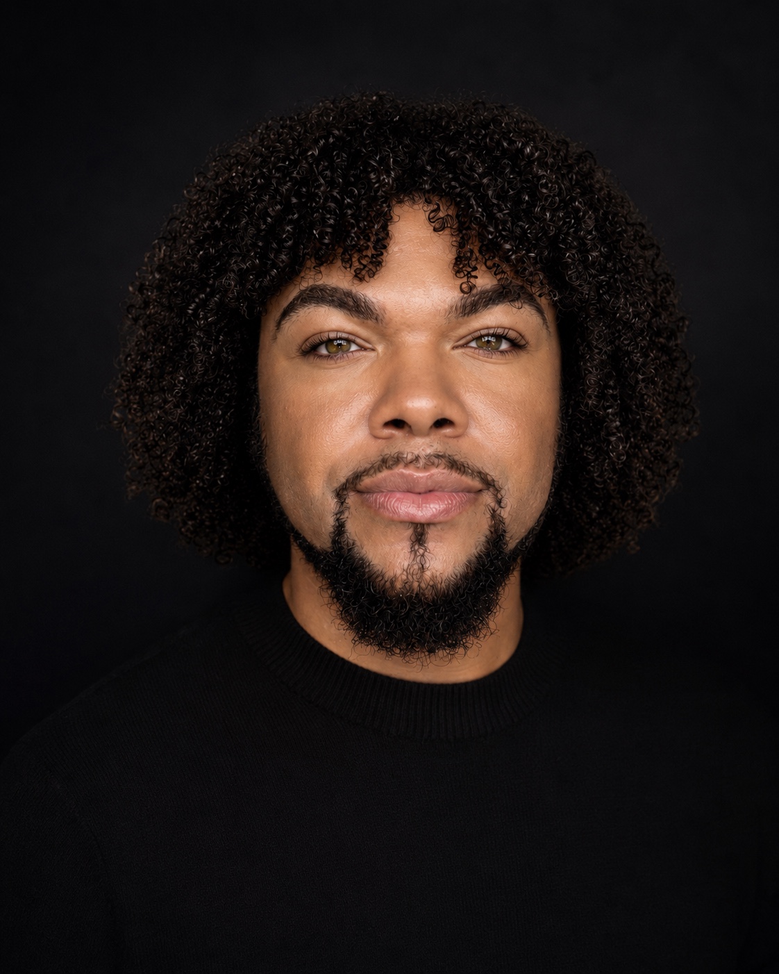 A present-day studio portrait of author Jaylen Jaymes